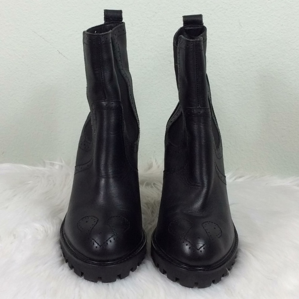 Kelsi Dagger black ankle boots with a 3.5” heel.
